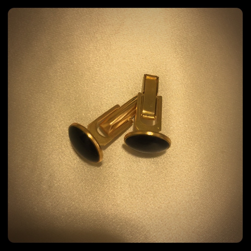 Black and gold cuff links.